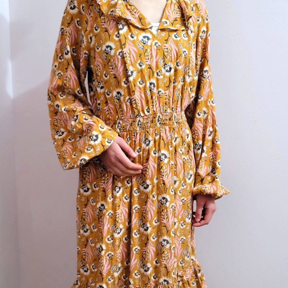 Mild pumpkin colored floral dress